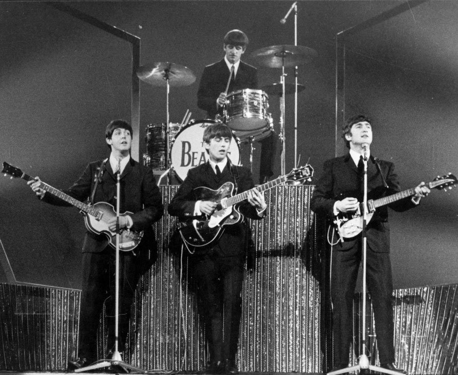 The Beatles on stage at the London Palladium during a performance in front of 2, 000 screaming fans, 1963