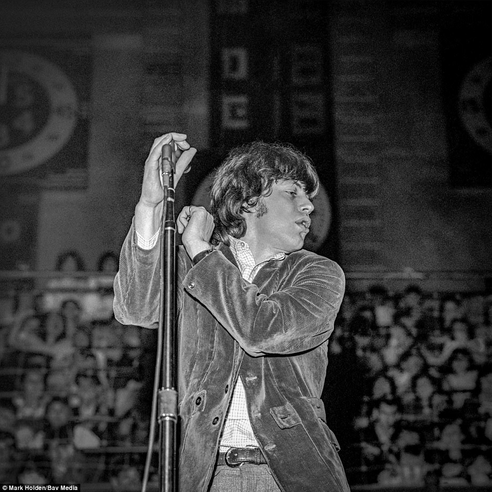Rolling Stones front man Mick Jagger is pictured performing at Maple Leaf Gardens in Ontario, Canada, in 1965