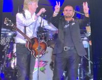 Paul McCartney and Ringo Starr reunite onstage to perform Beatles songs