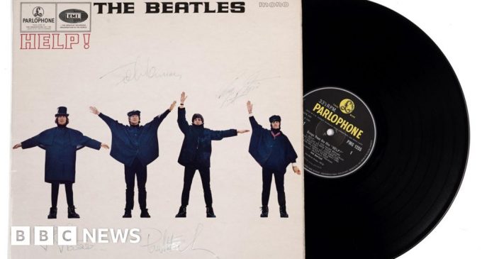 Rare album signed by The Beatles sells for £10,000 at auction