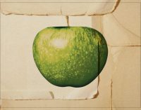 Which artist first signed to The Beatles’ Apple Records?