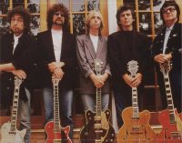 Who played the iconic solo on the Traveling Wilburys song?