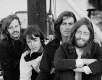 Which guest features on the most songs by The Beatles?